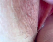 Clitoral stimulation while riding a dick. Close-up